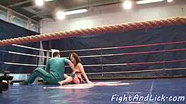 busty babe fingers cute teen after wrestling match in the ring, exploring shaved pussies with licks and fingering