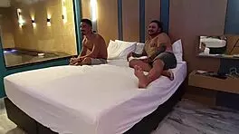 the sexy latina maid offers her pussy to the boss and his friend in the bedroom