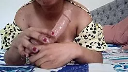 mature woman tests sex toy with blowjob