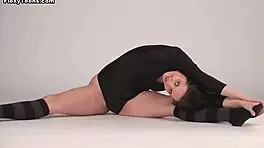 Inna Akkorova Stretches Flexible Body in Acrobatic Gymnastics Routine