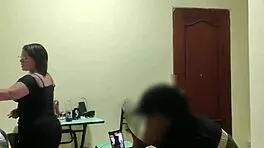 Young latina employee flirts seductively in bedroom