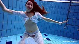 Redhead in White Dress, Pool Fun?