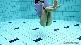 Blackhaired Aneta Relaxing In The Pool