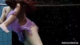 Blackhaired Aneta Relaxing In The Pool