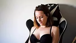 Busty Brunette Smoking In Black Bra