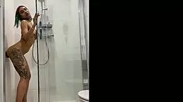 Tattooed teen uses sex toy in shower