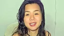 asian teen amateur gets excited by homemade music track