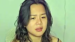 asian teen amateur gets excited by homemade music track