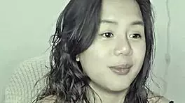 asian teen amateur gets excited by homemade music track