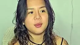 asian teen amateur gets excited by homemade music track