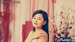 Chinese model posing session and striptease for playboy