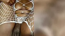 Black ebony woman uses the dildo