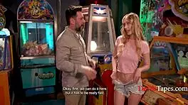 Blonde teen gets fucked outdoors while pac-man watches