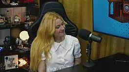 blonde bends over podcast table as tiny panties reveal her soaked pussy