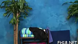 Oiled naked babe gets rough wet pussy massage and suck