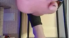 Woman in Black Leggings Teases with Subtle Fingering