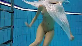 kristy big boob babe splashing in pool underwater