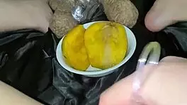 Saudi teen explores mango fruit play in Los Angeles home