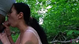 young brunette slut sucks fat cock till cum in forest