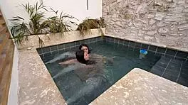 Two horny Colombians finger wet pussies publicly at pool risking exposure