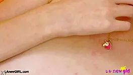 Hey check out this lovely blonde showing off her figure on sofa