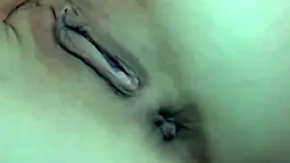 horny brunette stuffs dildo in holes