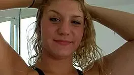 busty curvy amateur poses her natural big tits confidently