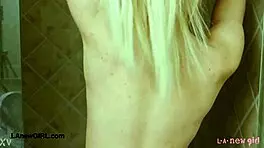 gorgeous blonde milf fresh from steamy shower