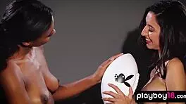 Ebony and Latina Footballers Strip Teasingly Together