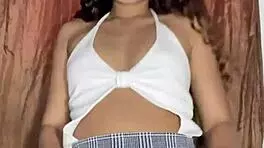 innocent petite babe lifts miniskirt to rub her sexy pussy