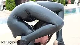 flexi latex doll bends wildly outdoors