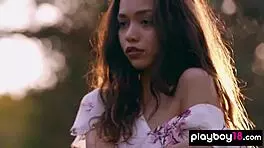 petite filipina kit rysha strips nude in wildflower field