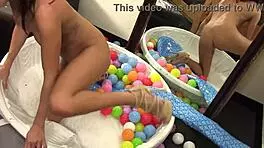 her perky nipples harden in ball pit playtime