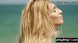 Check out this smoking Ukrainian blonde teen posing nude on the beach!