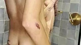 skinny petite girl indulges in steamy shower bathing play