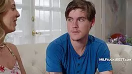 innocent blonde wife sneaks sloppy blowjob on young babysitter's throbbing cock behind hubby's back.