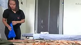 A young girl receives a relaxing handjob during massage session.