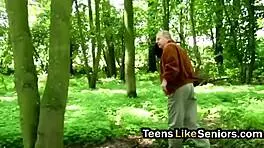 Old guy bends over brunette teen for outdoor doggystyle