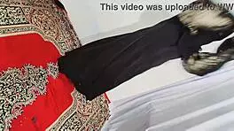 Arabic beauty in black hijab sways hips and bounces curves to exotic beats