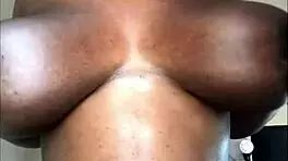 Huge boobs pregnant ebony babe teases natural tits solo.