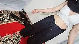 Arabic beauty in black hijab sways hips and bounces curves to exotic beats