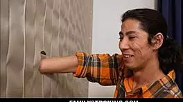 Cute brunette teen sucks big cock through gloryhole with kitty cam