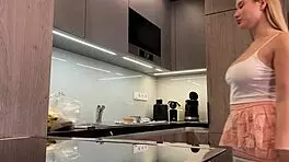 Big boobs blonde college coed flashes panties ass legs miniskirt chores