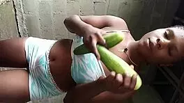 Local African Teen Strips And Teases With Cucumber