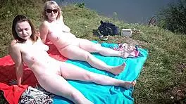 Mature Babe and Young Hottie Naked Sunbathing Public Beach