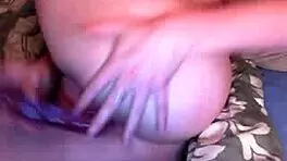 young brunette displays her smooth curves and natural figure solo