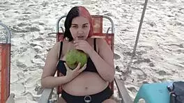 pregnant african beauty seduces beach crowd with her sexy belly