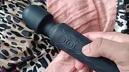 desi hottie strokes cock with feet while buzzing on bed