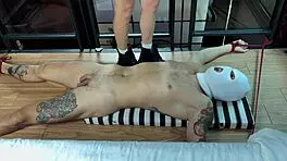 i strut confidently over his bare skin in tall boots