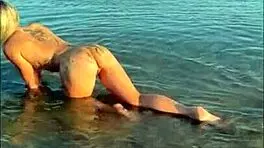 blonde euro babe kleo teases her wet tight pussy on sunny beach